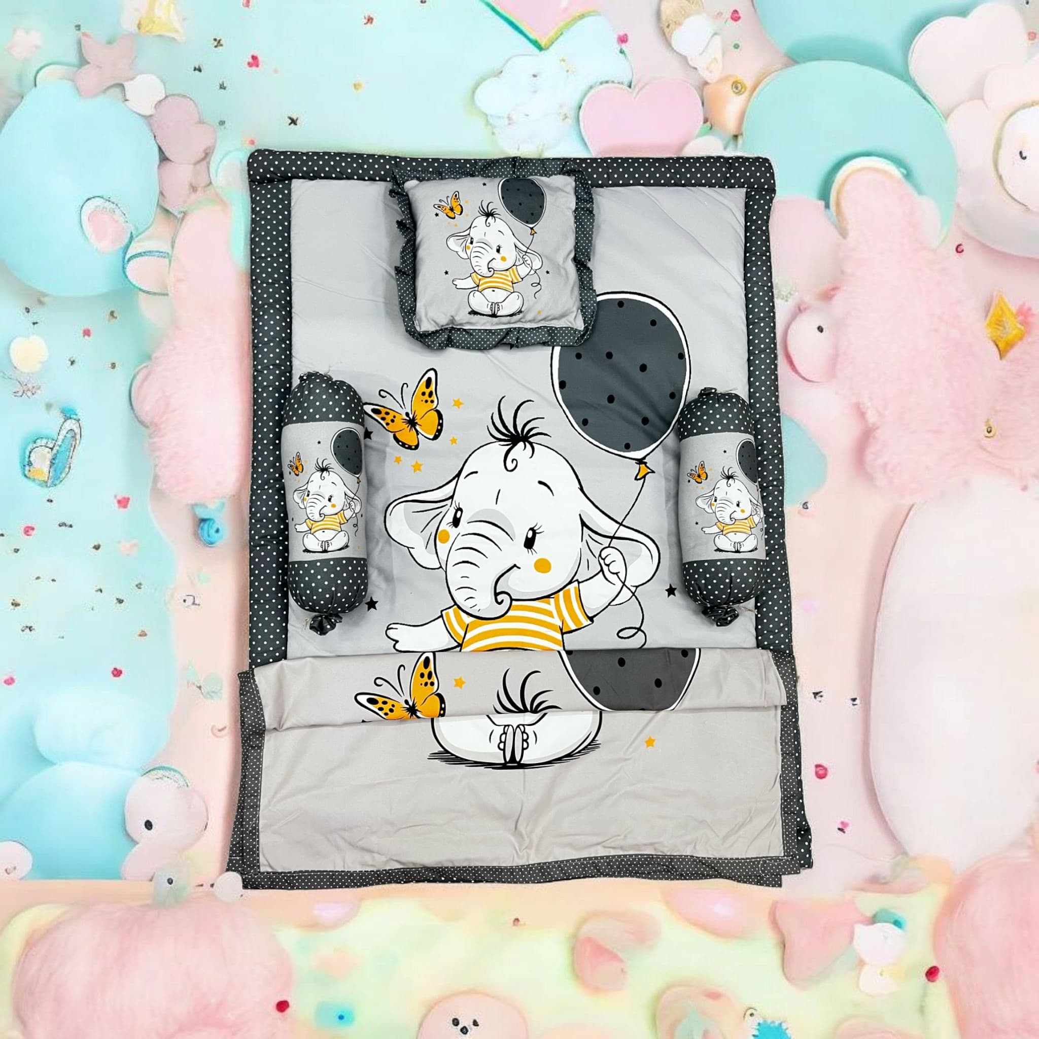 Green 7 in 1 newborn baby bedding set with elephant print, including sleeping bag, mattress, bolsters, pillow, and blankets. www.usmile.com